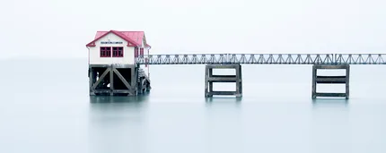 A long exposure of the  old Life Boat House on still waters creating dreamlike sense of stillness.