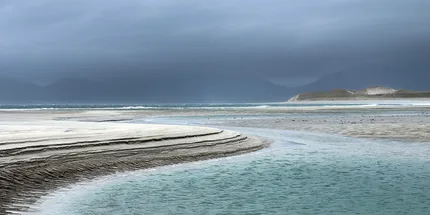Isle of Harris.  Seilebost Beach. Sculpted sand detail left by retreating tide.