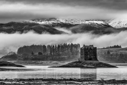 Castle Stalker sits on a tidal inlet in Loch Laich, Argyll, Scotland