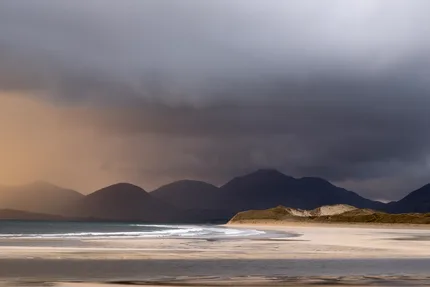 As a storm approaches over Luskentyre the colours change from a warm glow to palettes of brown and grey
